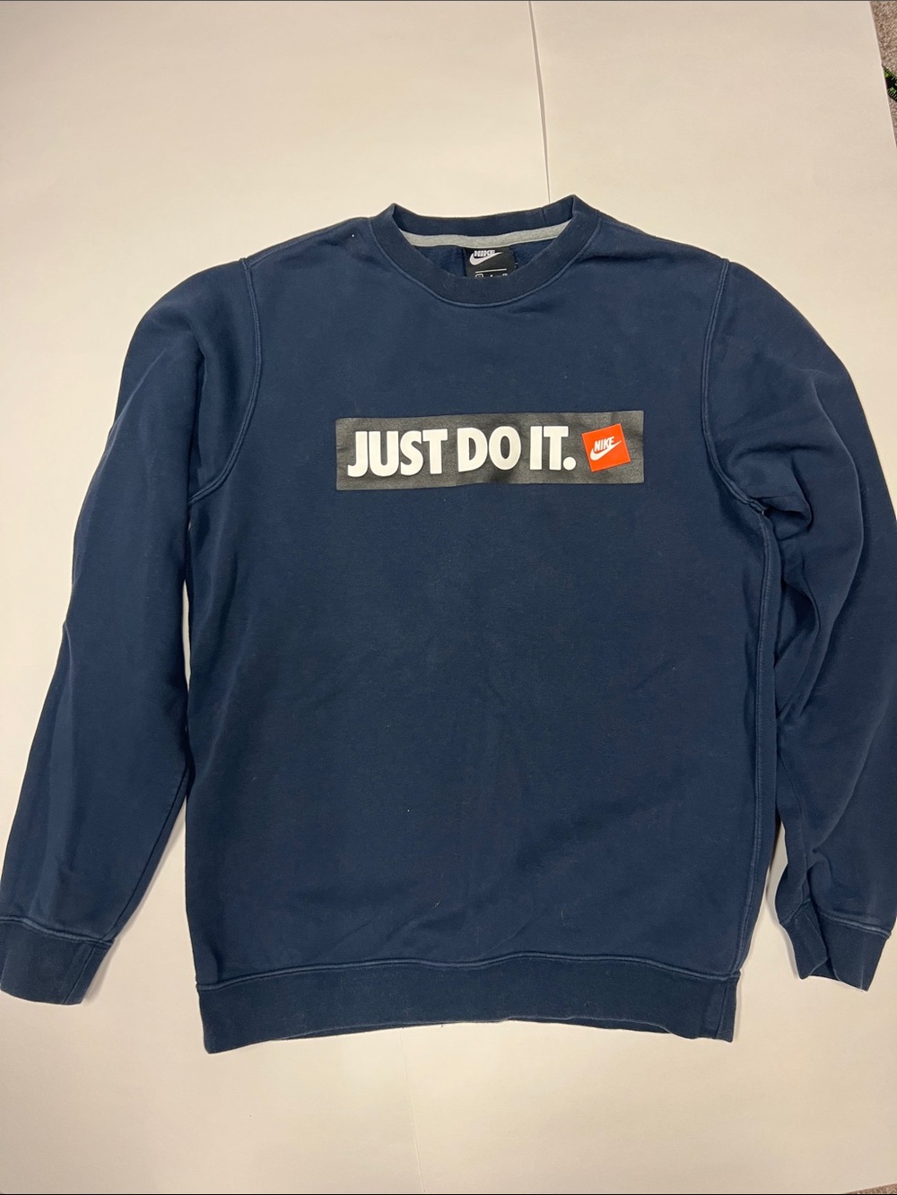 Nike Men's Navy Crewneck Sweatshirt with 'Just Do It.' Logo